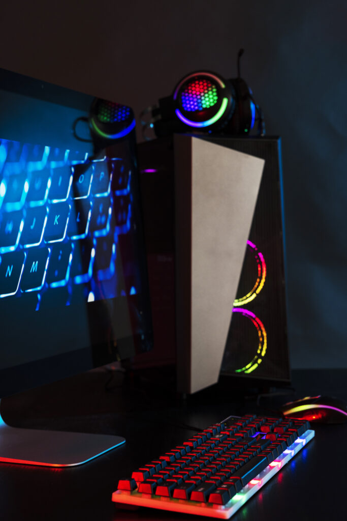 gradient view illuminated neon gaming desk setup with keyboard